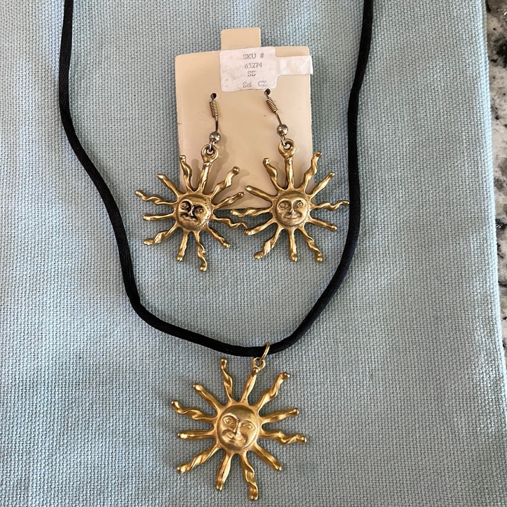 Sun face necklace and earrings.